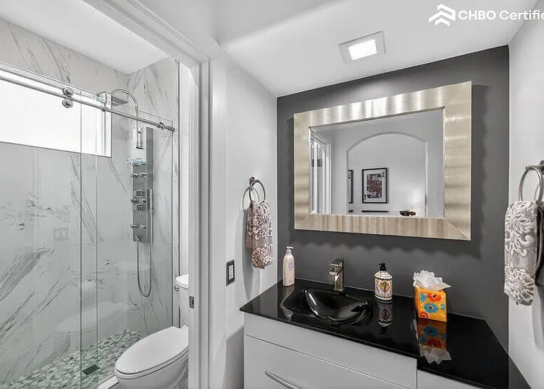 Light filled marble shower in Roal Suite