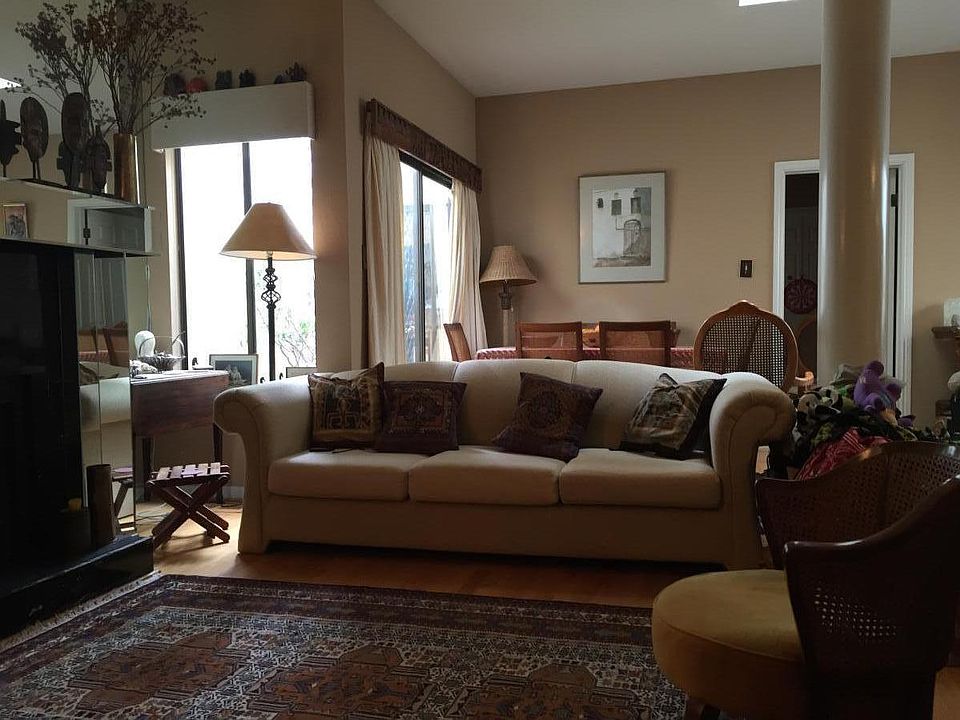 LIVING ROOM. WOOD BURNING FIREPLACE ON LEFT