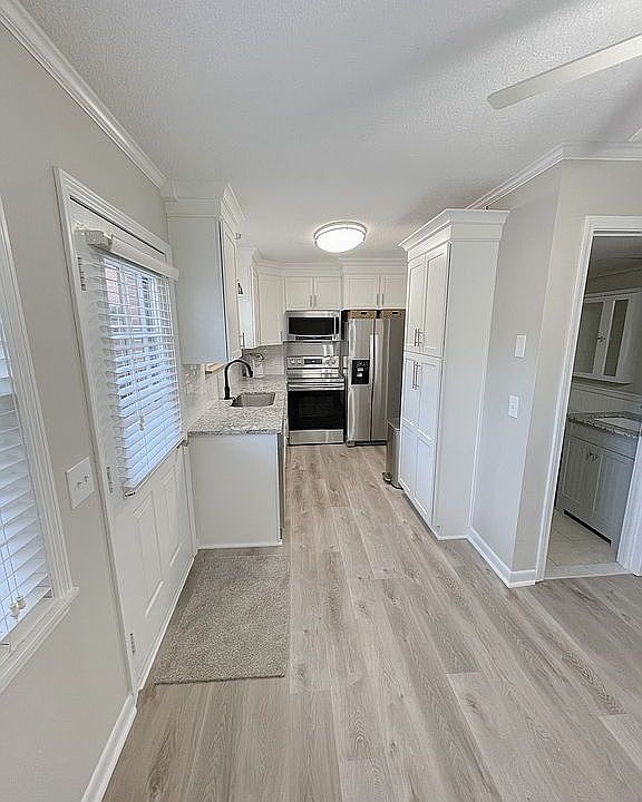 Kitchen view from Dining Rm