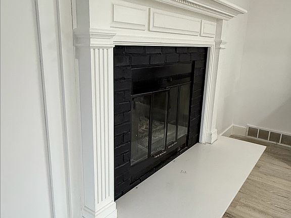 Fireplace mantle ready for your family photos and winter stockings! (Real wood burning)