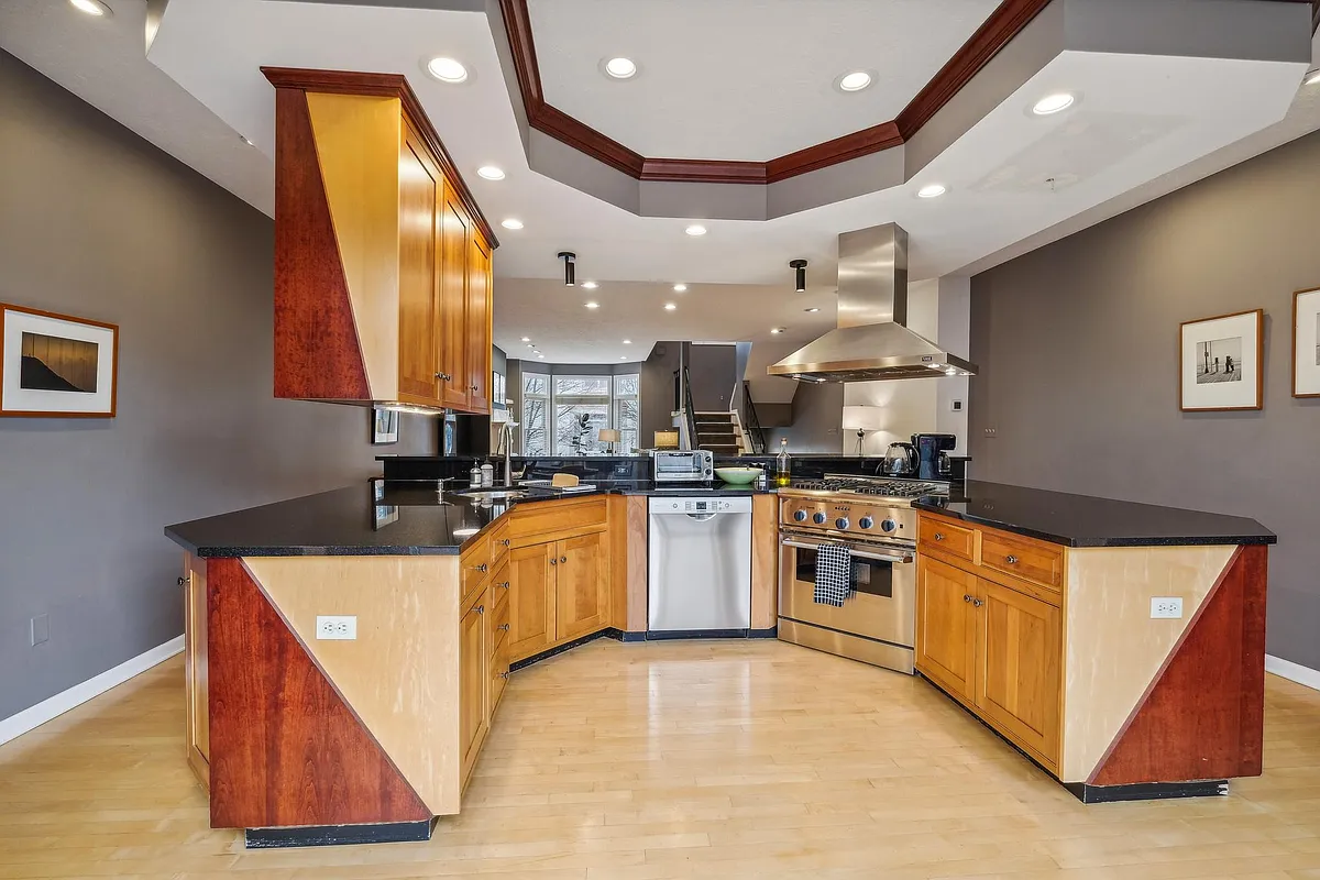 Stylish kitchen with Thermador oven, Bosch fridge and dishwasher. Built in Microwave. - 71 Waterfront Dr