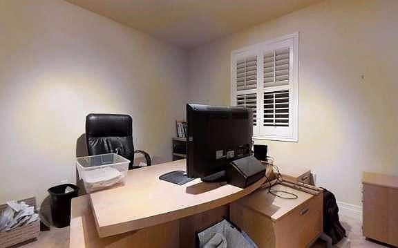 Office downstairs, right by front door entrance.