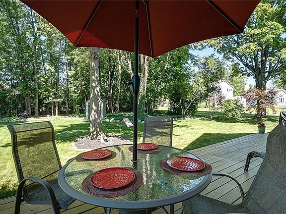 Table View of the Generous Size, Flat and Private Backyard. So Many Memories to be Made Back Here!