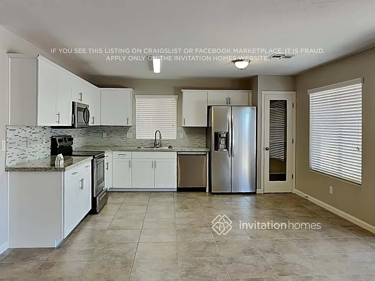 11012 E Aspen Ave — Photo 5