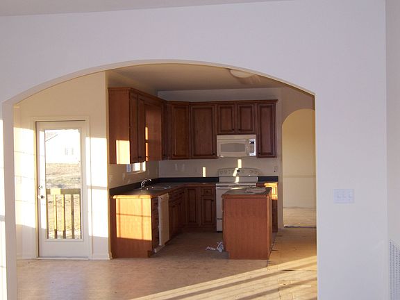 From Family Room Archway toward kitchen w/island
