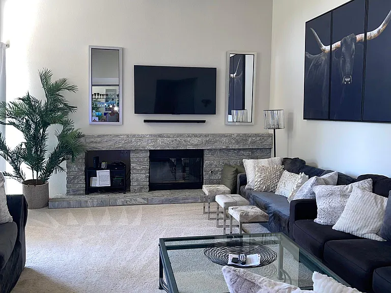Spacious living room with plenty of seating to enjoy family movie night or to catch your favorite sports team. The kids can also sign in to their Xbox account.
