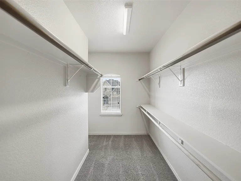 Bedroom 2 upstairs with huge walk in closet with windo