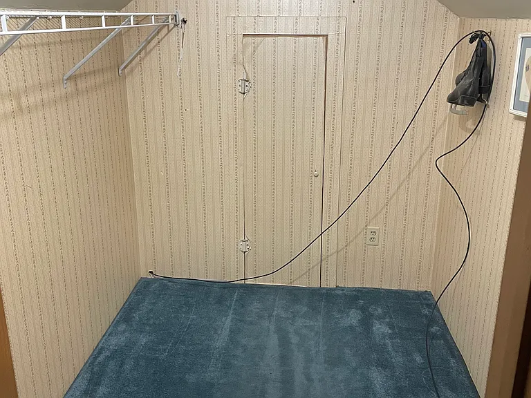 Walk in closet attached to bedroom