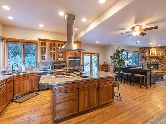Kitchen into Family Room w/Sofa Bar.