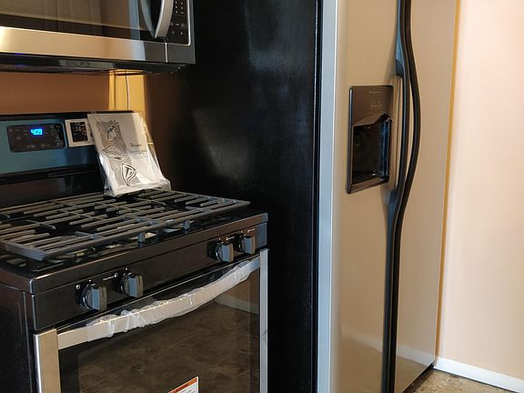 New microwave & gas range (gas included), and recently purch