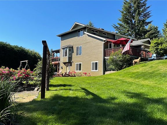 Pride of Ownership in this 5 bd, 3.5 bth on.49 acre lot with a Mt. View! Private deck and entry to Man Cave/Mother-In-Law/Rental Unit! Raised gardens, privacy landscape, fire pit with multiple parking areas for that RV, boat and off-road toys! Lots of parking!