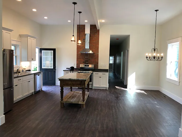 Kitchen with stainless appliance and large dining area