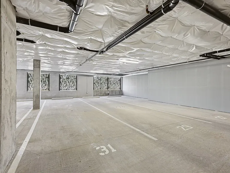 2 Parking Spaces Inside of Secure Garage #31 & # 32