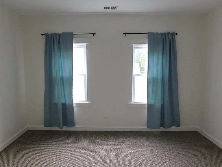 3rd bedroom. Could also be used as a formal dining room or office.
