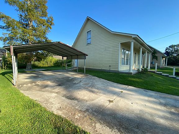 view the side. covered parking and entry through the mud room.