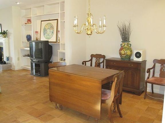 Dining Area with Hardwood Floors throughout