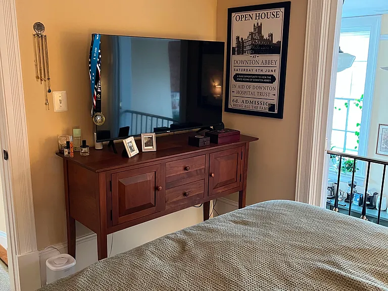Opposite view of loft bedroom (or office). Pocket doors in the opening enable quiet and privacy.