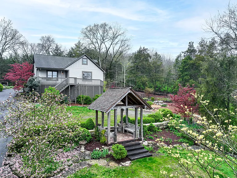 Front view of house with Cedar Pavillion and terrace garden