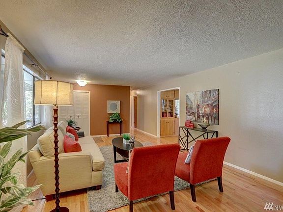 Wide entry into the kitchen and hallway make it easy to entertain from one room to the next.