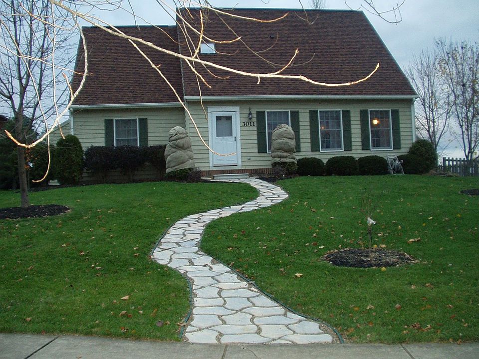 Front in Fall. Bushes wrapped to protect from early snowfall.