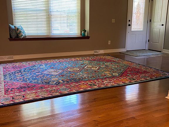 real hardwood flooring in living room, kitchen