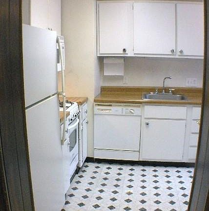 Kitchen: Fridge, stove, oven, microwave.