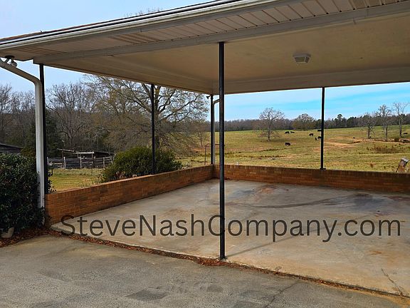 Carport & Double Concrete Driveway