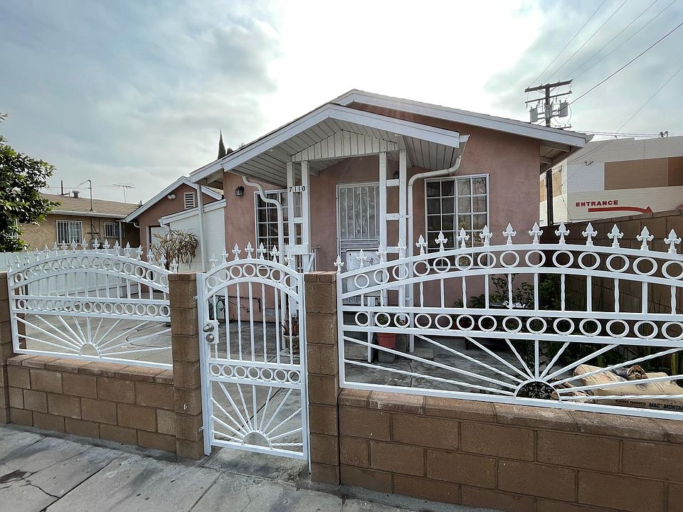 Street view from Converse Ave. Brand new mata gate and stone fence.