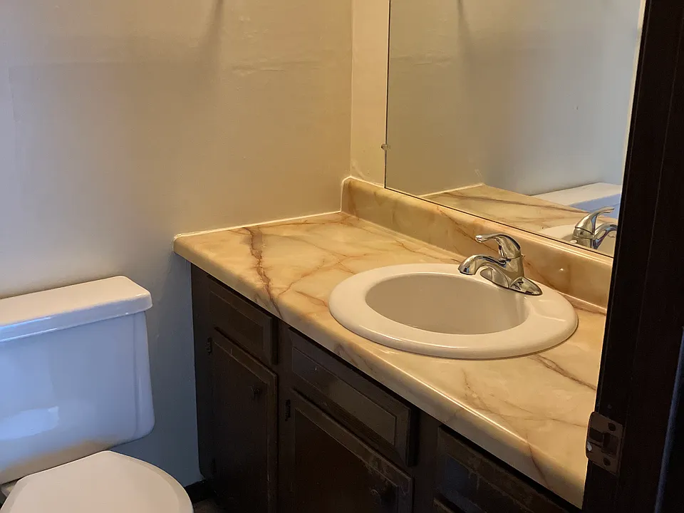 Convenient powder room off the kitchen
