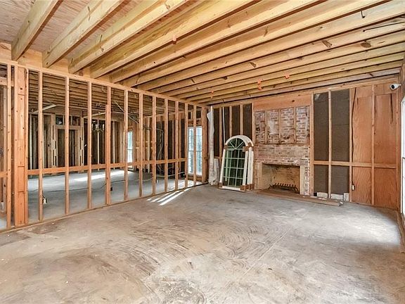 Formal living room/ office with fireplace