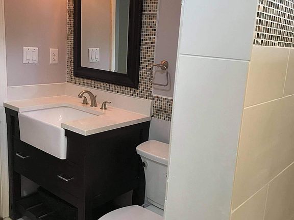 New bathroom- new vanity, new toilet, new tiles