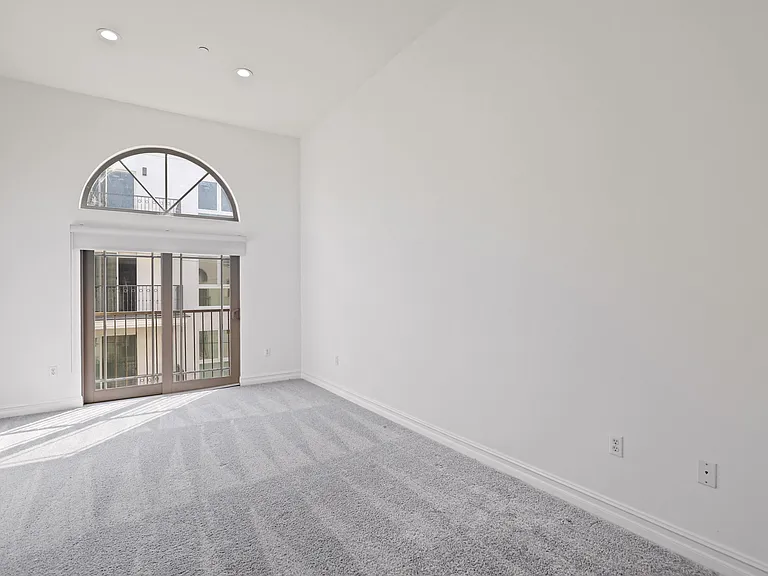 Bedroom with Double Doors Leading to Balcony