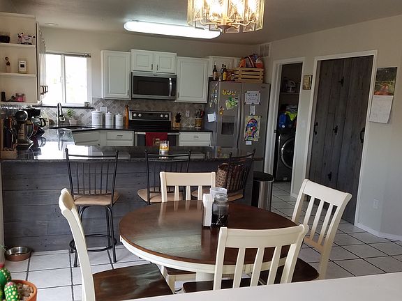 Dining nook, bar and kitchen