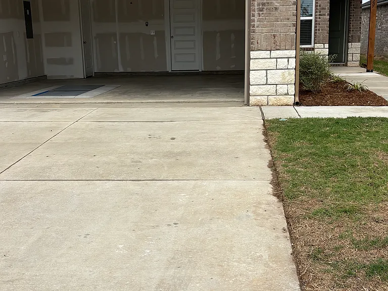 Two car garage with storm shelter