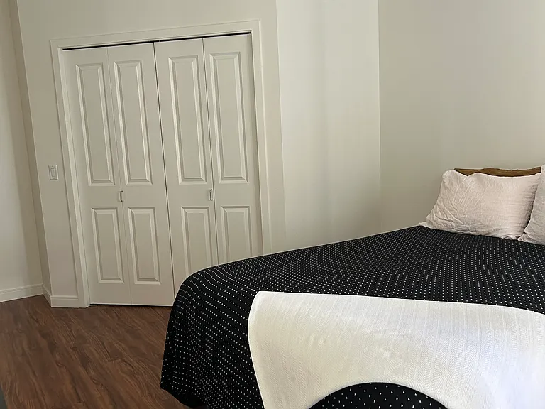 Bedroom with updated flooring