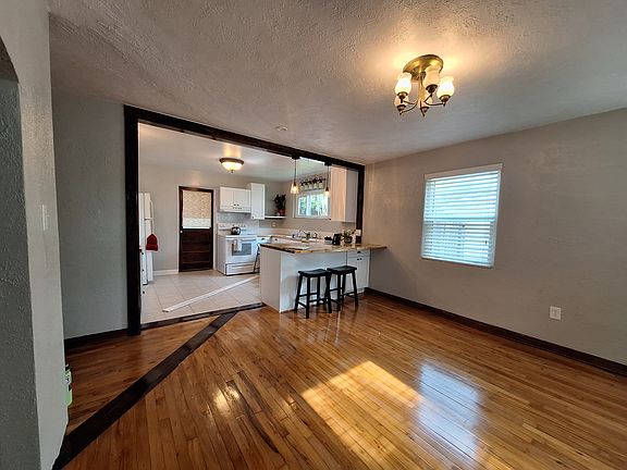 Dining room opens up to the kitchen. Great gathering spot, with lots of natural light.