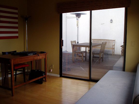 upstairs loft looking out to patio