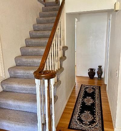 Real HardWood Floors 
Entry With Formal Staircase