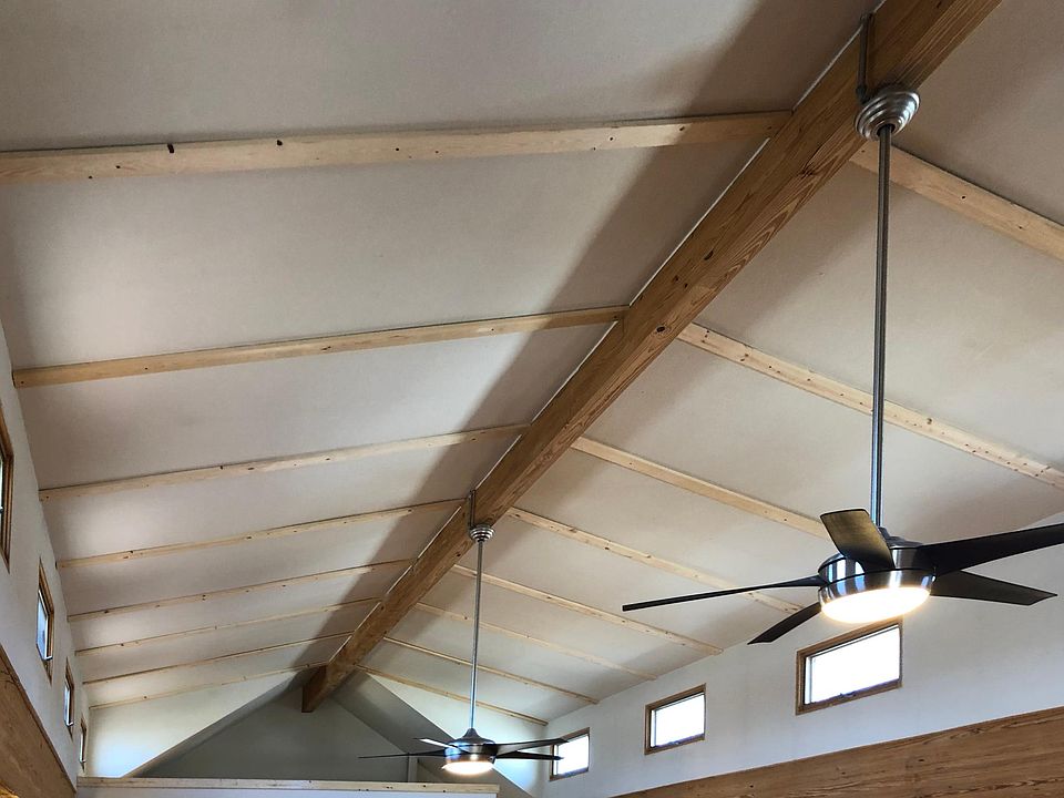 Ceiling is vaulted and brings in great natural light.