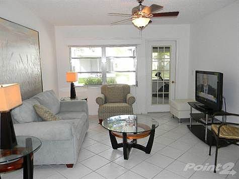 Diagonally tiled living room