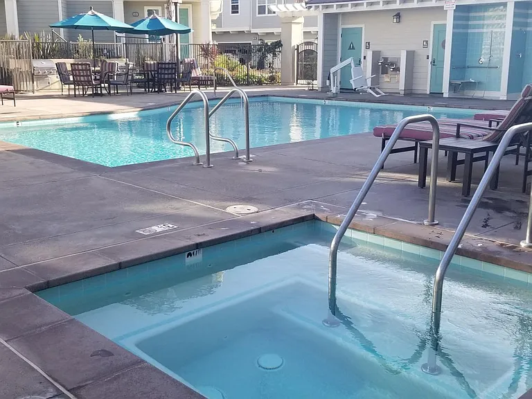Community hot tub, pool, grills, and playground