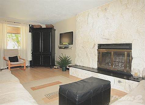 Cozy Up To This Gorgeous Fireplace!