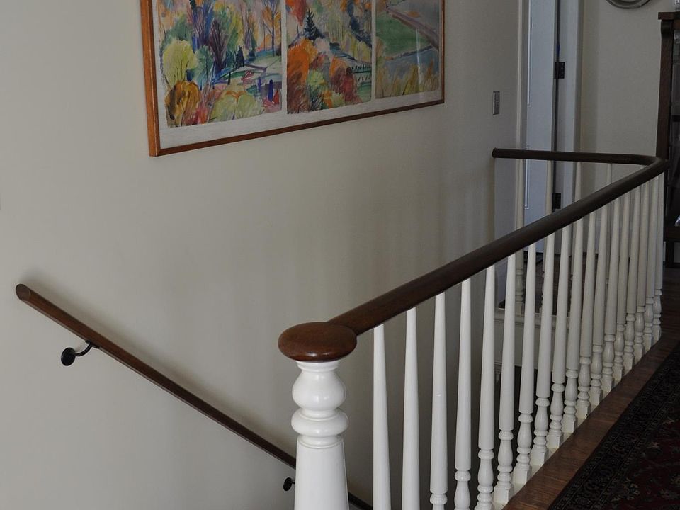 hallway within apartment, at top of stairs