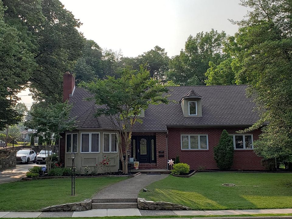 Street view of home, entry is in back of the house