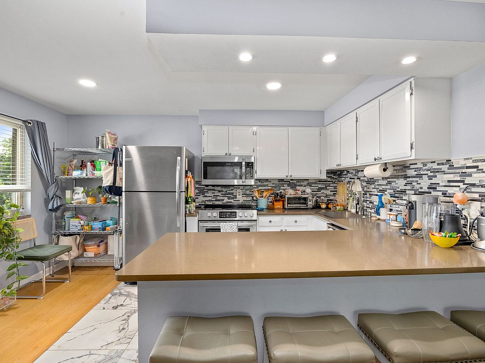 Four stools to accompany the breakfast bar