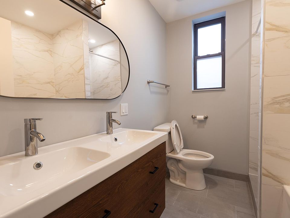 Bathroom - double vanity, shower and bathtub