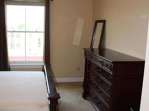 furnished master bedroom