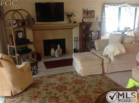 fire place with T.V. mounted above.