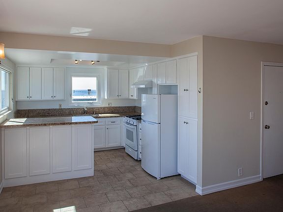 looking at the kitchen from the living room
