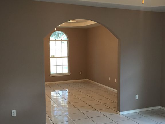 Dining room looking into living room